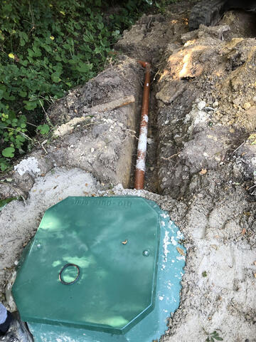 Outlet pipework for a small sewage treatment plant